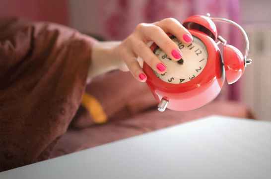 Woman+throwing+alarm+clock+away